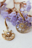 Crescent moon and sun earrings
