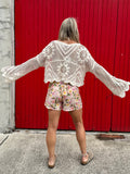 Scalloped floral crochet top