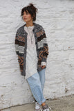 Earth toned geometric knit cardigan