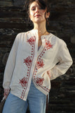 Floral embroidered cream shirt