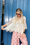 Scalloped floral crochet top