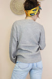 Grey cardigan with bobble detail