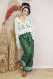 Embroidered green trousers